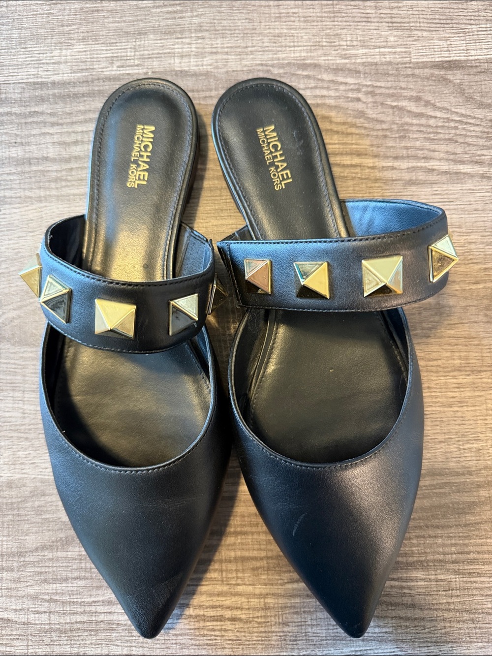 MICHAEL Michael Kors Black Leather Pointed Slide Mules with Gold Studs